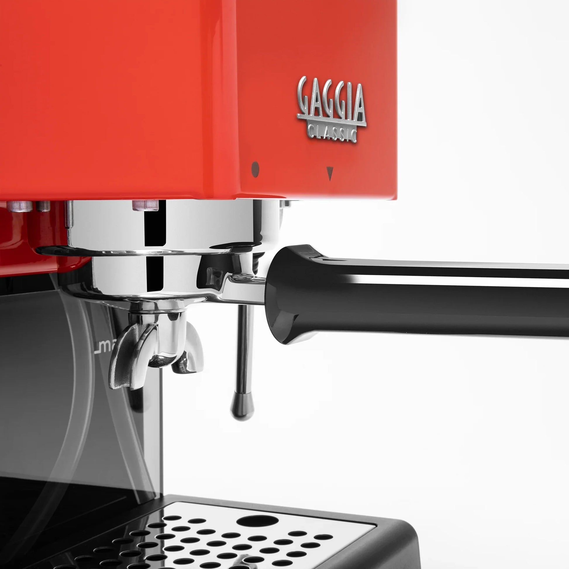 Close-up of a Gaggia Classic coffee machine with a bright red body, polished chrome portafilter and steam wand, and a black handle on a white background.

